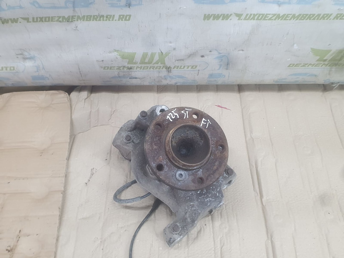Fuzeta stanga fata 6773209-0 BMW Seria 1 E81/E82/E87/E88 (facelift) (2007 - 2012)