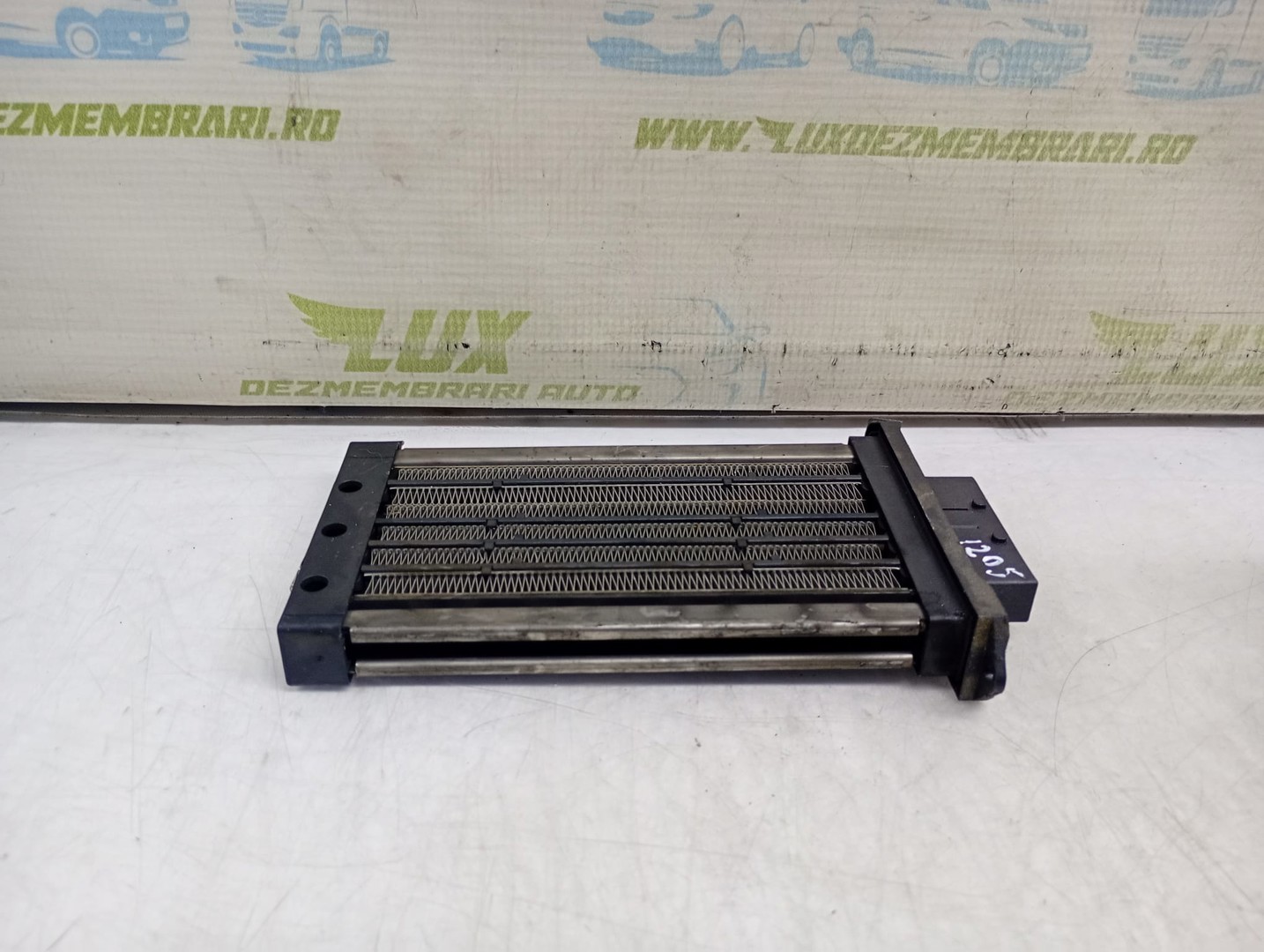 Radiator electric bord F667211Z-C Dacia Logan 1 (2004 - 2008)
