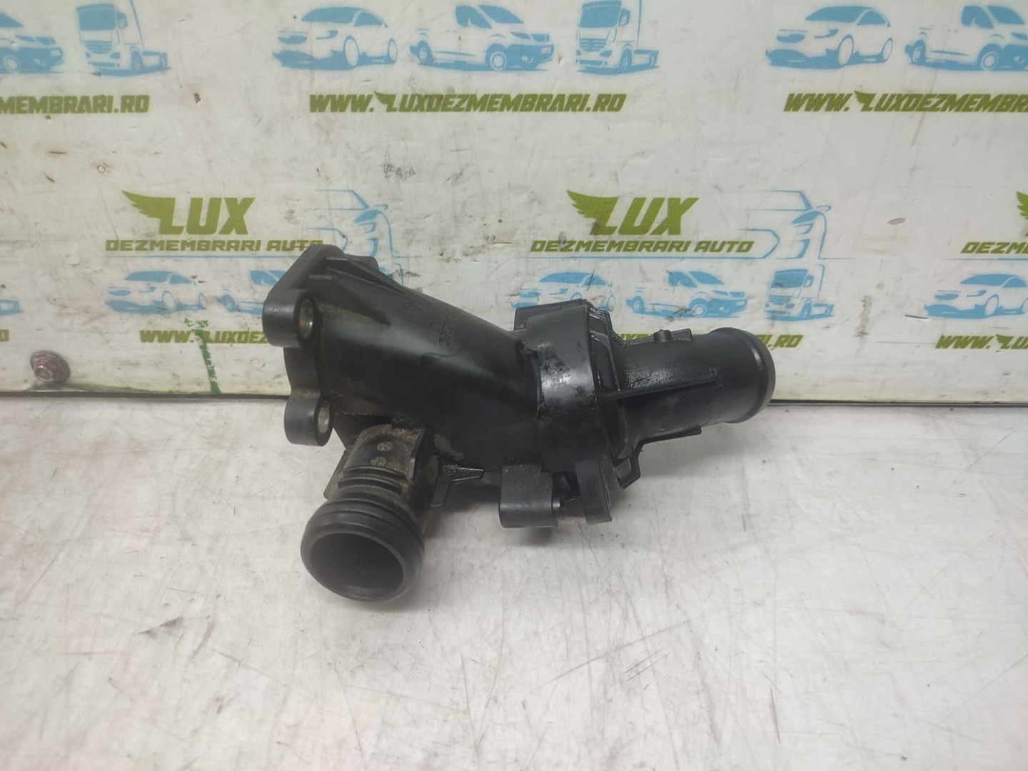 Carcasa termostat 04B121111C Volkswagen Polo 5 (6R) (2009 - 2015)