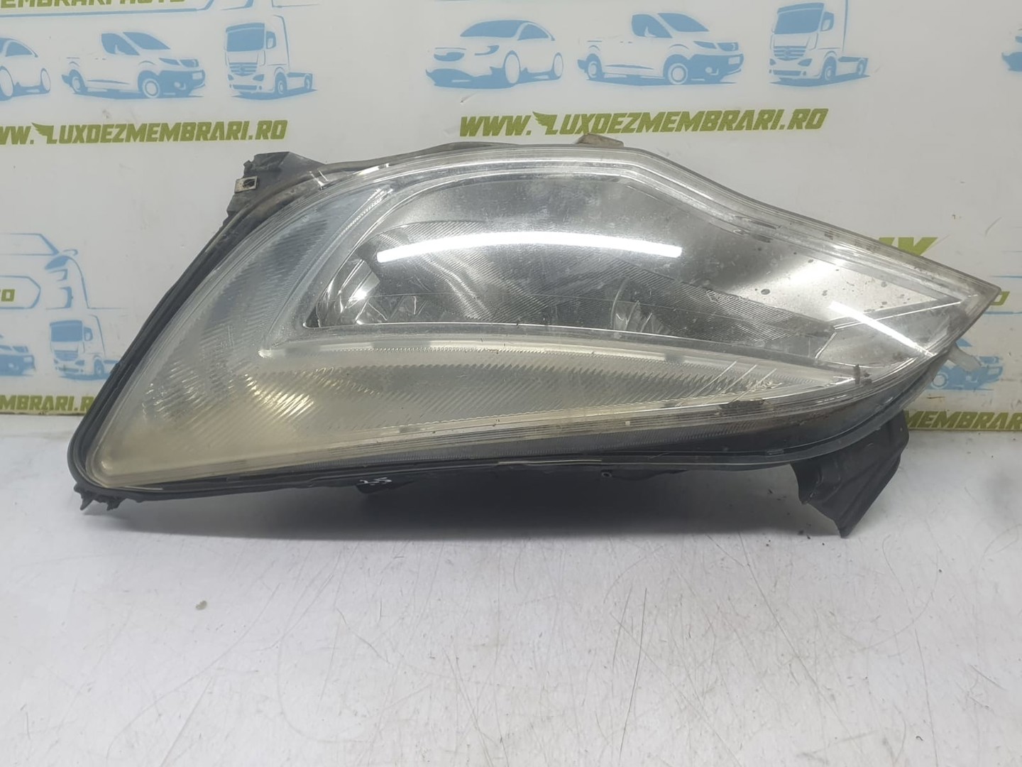 Far stanga 282000000002 Opel Astra J (2009 - 2012)