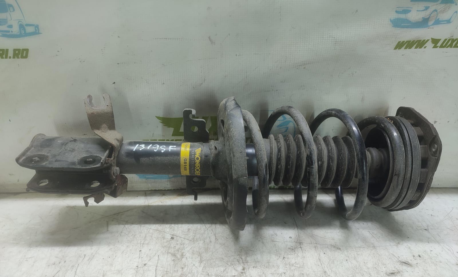 Amortizor cu arc stanga fata Renault Megane 3 (2008 - 2014)