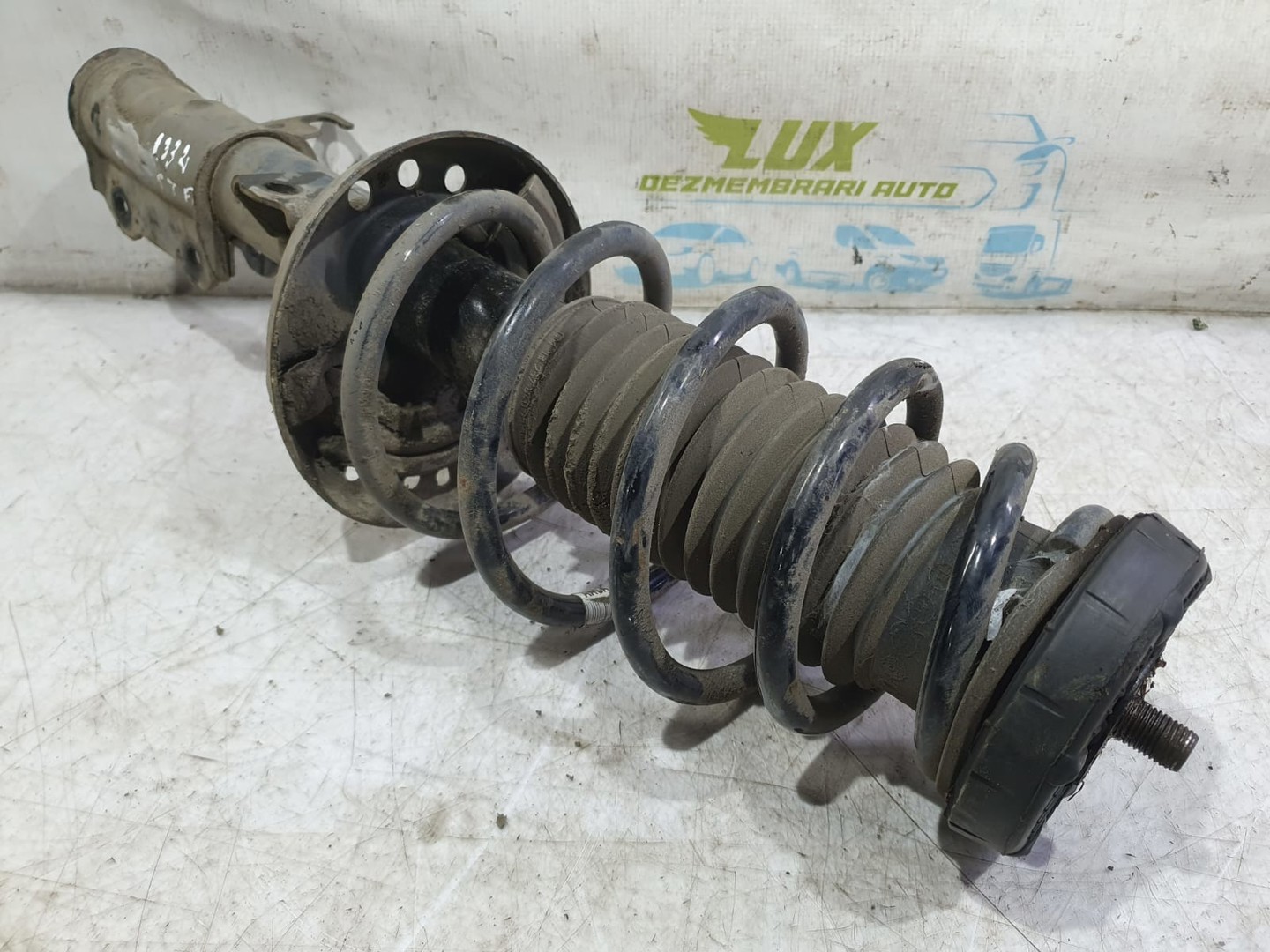 Amortizor cu arc stanga fata 13354026 Opel Astra J (2009 - 2012)