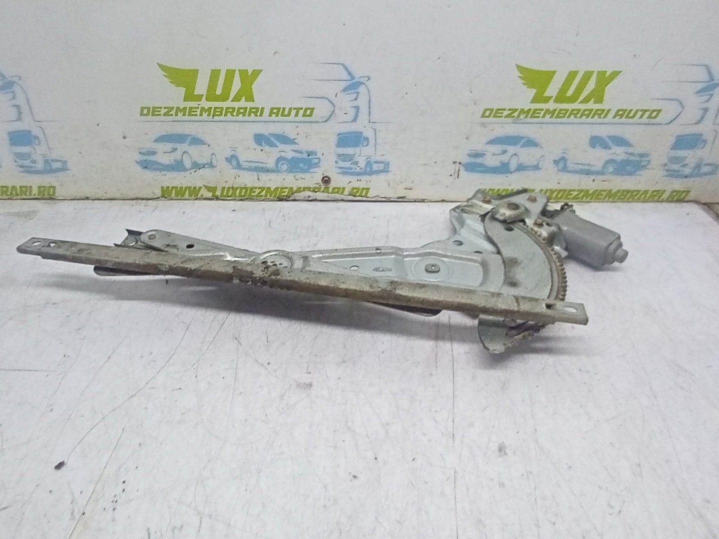 Macara geam stanga spate 0K2FA597356Y XH504P0 Kia Carens 2 (2002 - 2006)